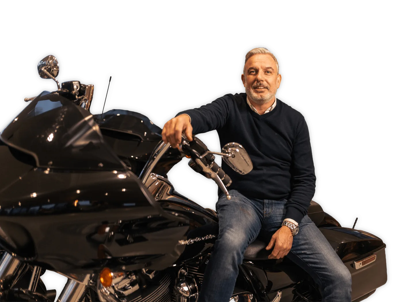 Wim van der Wekken, eigenaar van MotoXpert, op een Harley-Davidson